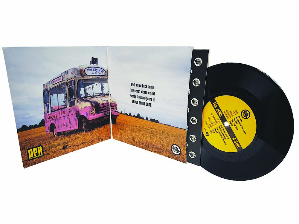gatefold 7 inch sleeve with record and printed inner